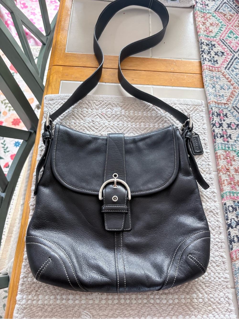 Coach Black Leather Crossbody Bag with Buckle Accent